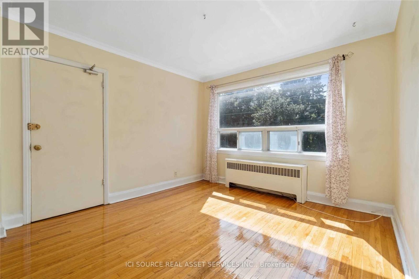 2 - 116 Eastwood Road, Toronto, Ontario  M4L 2C9 - Photo 7 - E12910716
