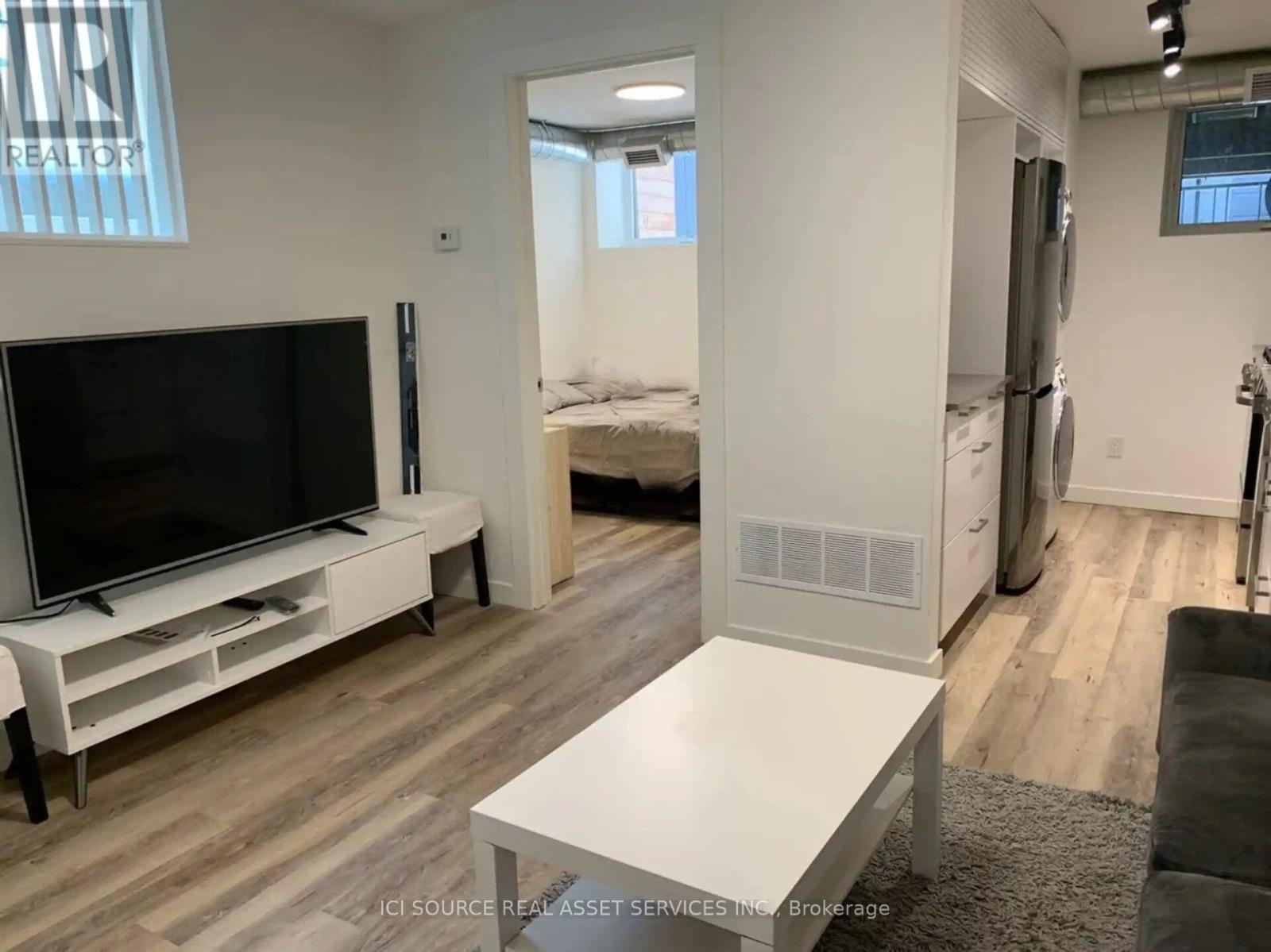 A - 56 Jones Avenue, Toronto, Ontario  M4M 2Z8 - Photo 2 - E13730168